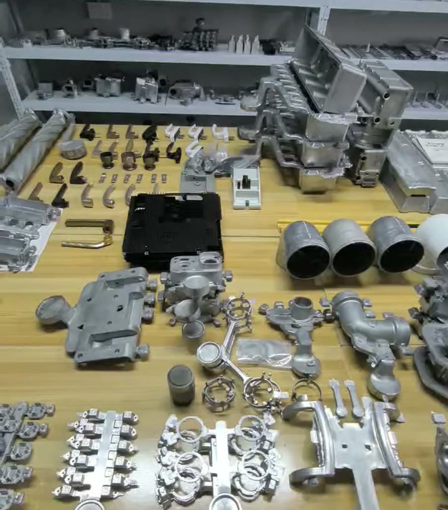Table displaying a wide variety of cast metal samples